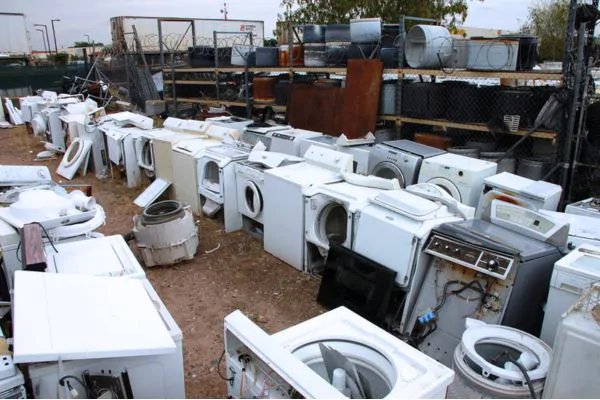 old washers and dyers on the junkyard